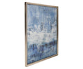 Abstract Sea Wall Art in Blue/Multi features a framed giclée print with textured blue and white brushstrokes inspired by coastal textures, creating a dynamic sense of movement and depth. The artwork is presented in a metallic or light-colored wood frame.