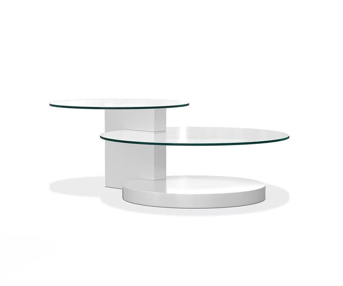 The Adria Coffee Table showcases a modern design with two circular tempered glass tops at varying heights, supported by a central rectangular pillar and a round base, all presented against a clean white background.
