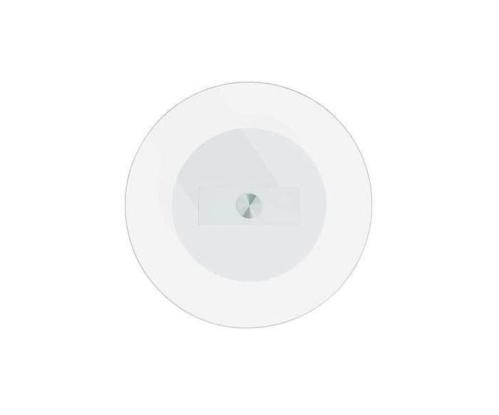 A round, white, modern ceiling light fixture seen from below features a central metallic accent and a frosted cover, set against a simple white backdrop—its contemporary aesthetic mirrors the sleek design of the Adria End Table.