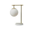 The Aerlig Table Lamp, shown here in Brass-Marble, features a round white glass shade atop a brass-colored metal frame and a circular marble base, all set against a plain white background. This lamp effortlessly combines vintage-inspired elements with modern design for an elegant, timeless appearance.