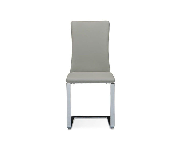 A contemporary Alma Dining Chair in GREY, designed with a tall, curved backrest and sleek light gray upholstery, features a modern metal sled base—making it an ideal choice to enhance any dining space. Shown here against a plain white background.