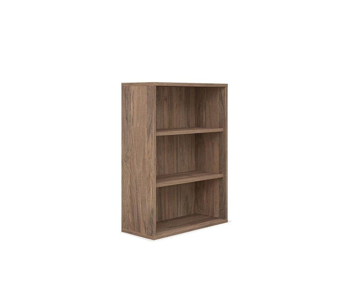The Arren Low Bookcase is a simple, rectangular wooden bookcase with three shelves, shown on a white background. This eco-friendly piece features a natural wood grain finish and is pictured empty.