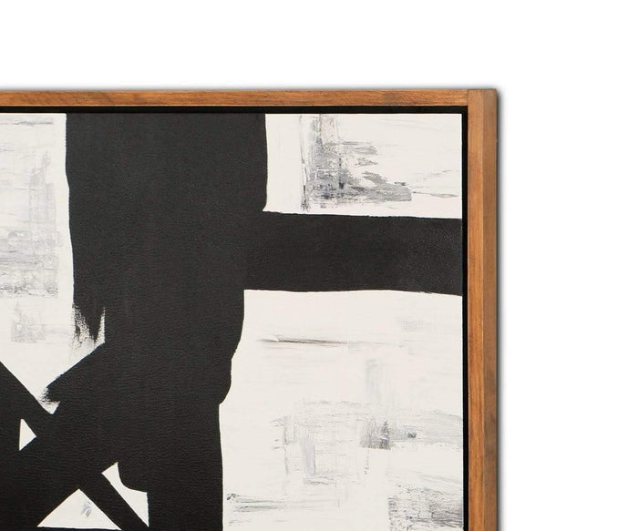 Partial view of the Balkon Abstract Graphic Wall Art, an abstract black and white painting featuring broad, bold black lines intersecting over textured white areas, elegantly framed in a light brown pine wood frame.