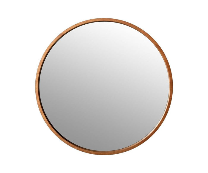 The Baptisia 35″ Round Mirror, featuring a thin cherry wood frame and set against a plain white background, showcases modern artistry in its minimalist design.