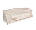 The Beck Outdoor Sofa Cover in beige is draped over a rectangular sofa, featuring gathered edges and a drawstring at the bottom left corner. This water-resistant cover offers reliable, all-season protection for your outdoor furniture.