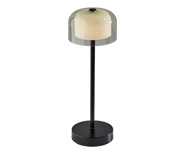 Introducing the Benji Cordless LED Table Lamp in black—a modern table lamp featuring a sleek black base and stem, paired with a dome-shaped translucent lampshade that reveals a light-colored bulb inside. This contemporary design offers adjustable brightness, allowing you to effortlessly create the perfect ambiance for any space.