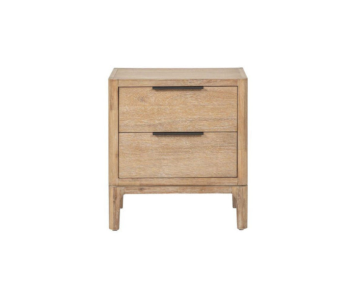 The Camen Nightstand, crafted from solid natural acacia, features two drawers with black horizontal handles. Standing on four legs and set against a plain white background, its light wood finish brings a touch of elegance to any space.