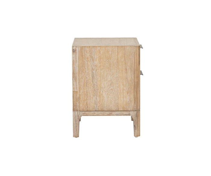 Side view of the Camen Nightstand, showcasing a simple, modern design crafted from light wood. The visible acacia grain highlights the natural beauty of the solid wood construction. This nightstand features two drawers with subtle metal handles and stands on four sturdy legs.