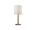 The Cara Table Lamp features a modern design with a cylindrical white fabric shade, a slender brass-finished metal stem, and a rectangular dark metal base. A pull chain switch hangs just below the shade.