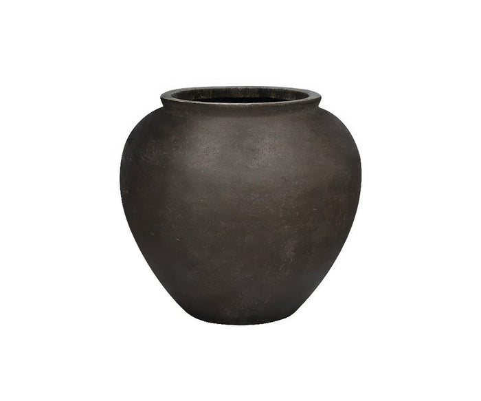 The Coleen Planter is a large, round black ceramic vase featuring a wide body, a narrow base, and a slightly flared rim, reminiscent of a classic planter design, displayed against a plain white background.