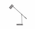 The Collette Desk Lamp with USB Port, shown in steel, features a modern design with a cylindrical shade, angled arm, and rectangular base—plus a convenient USB port—and is photographed on a white background.