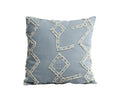 Constellation Pillow Cover in light blue, showcasing a modern geometric pattern woven from cream and blue threads, set against a white background.