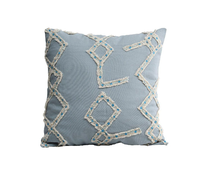 Constellation Pillow Cover in light blue, showcasing a modern geometric pattern woven from cream and blue threads, set against a white background.