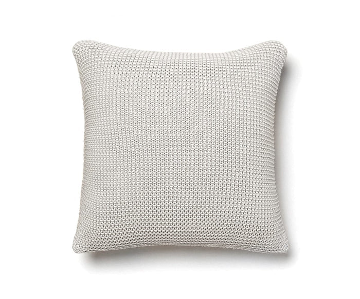 A square Cooper Pillow in Cooper Fog is displayed against a white background. This pillow showcases a retro-cozy, tightly knit cotton yarn fabric with slightly rounded corners.