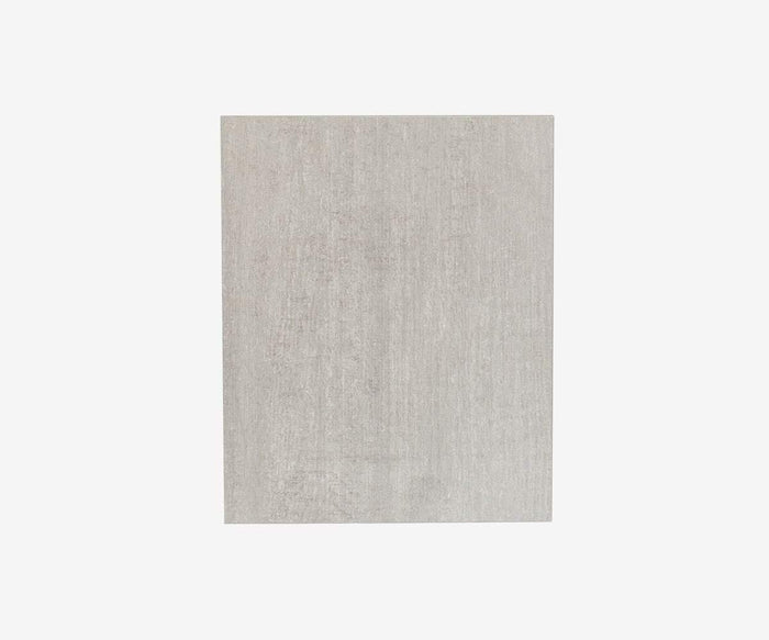 A Danne Wall Cube with a light gray, textured faux-cement finish is displayed vertically against a plain white background.