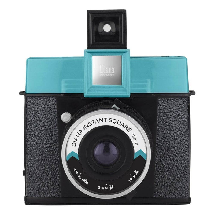 Diana Instant Square analog instant camera with turquoise top and black textured body, featuring 75mm lens and waist-level viewfinder.