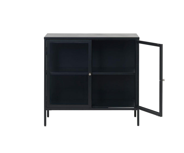 The Dion Two-Door Cabinet features a sturdy black metal framework with four legs, two interior shelves, and tempered glass front doors. The right door is open, revealing the empty shelves inside. This modern cabinet showcases a sleek, minimalist design.