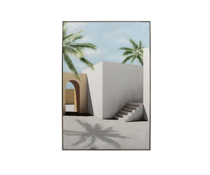 The Distant Escape II Oil Painting features a hand-painted canvas in multi colors, portraying a minimalist white building with stairs, palm trees, and an archway beneath a blue sky. A palm tree’s shadow stretches across the foreground, capturing the tranquil ambiance of a tropical cityscape.