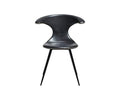 The Drake Dining Chair in black features a modern design with a curved, winged backrest, metal legs, and a cushioned seat, photographed against a plain white background.