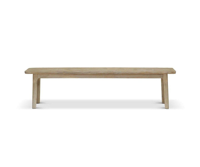 The Eckler Bench features a flat rectangular seat and four legs in a sleek Havana Grey finish, displayed against a plain white background.