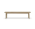 The Eckler Bench features a flat rectangular seat and four legs in a sleek Havana Grey finish, displayed against a plain white background.