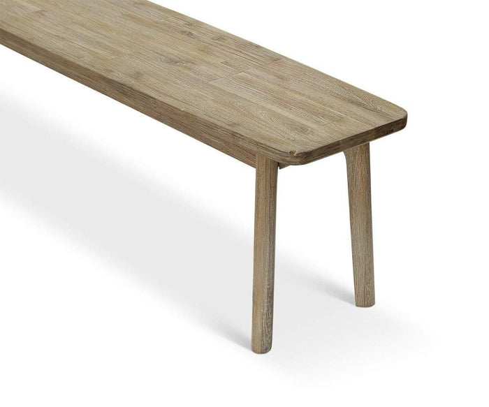 The Eckler Bench is a simple wooden dining room bench featuring a rectangular seat and three visible legs, crafted from solid acacia wood and displayed on a white background with a soft shadow.