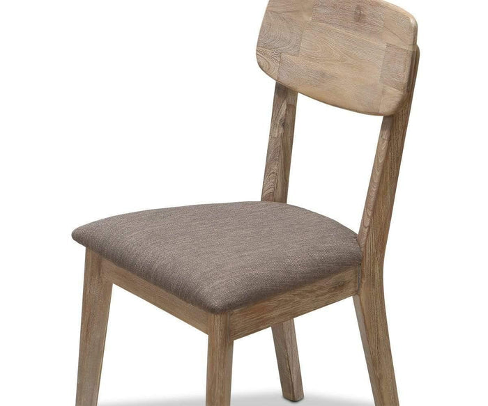 The Eckler Dining Chair is crafted from solid acacia with a light brown finish, and features a gray upholstered seat and a simple, slightly curved backrest.
