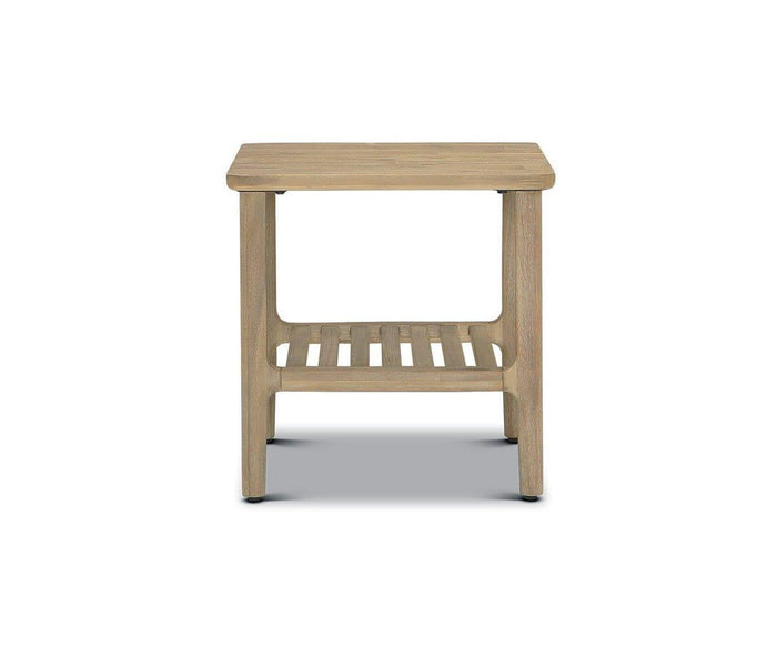 The Eckler End Table in Havana Grey features a square top, a lower slatted shelf, and simple straight legs for a minimalist look. Shown against a white background.