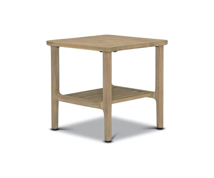 The Eckler End Table, crafted from light acacia wood, features four legs, a rectangular top, and a lower slatted shelf, displayed against a plain white background.
