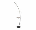Introducing the Elska Floor Lamp in black—a modern lighting solution featuring a sleek, curved stand and a sturdy round base, complete with an integrated small round side table for extra convenience. The arched LED light extends gracefully from the table’s edge, blending contemporary design with practical functionality—an ideal addition to any modern living space seeking both style and innovation.