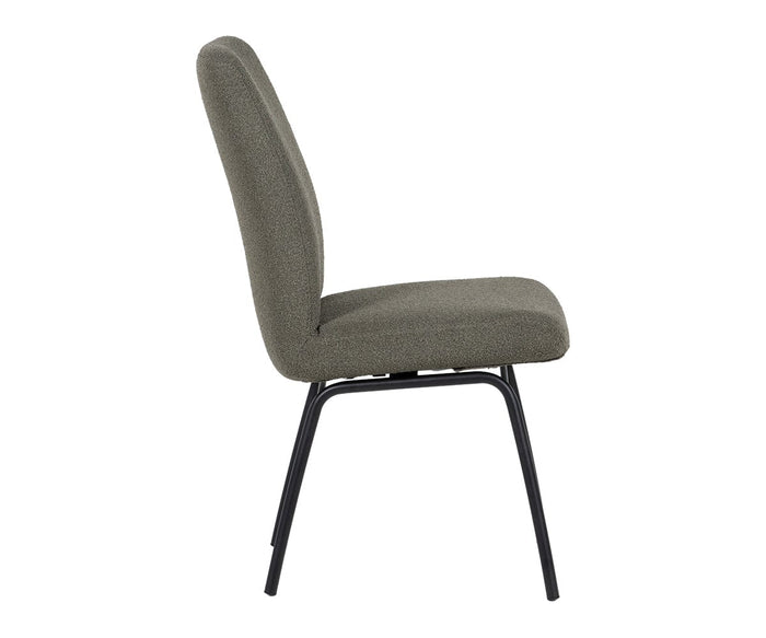 Side view of the Elyse 1000 Dining Chair, showcasing its gray upholstery, cushioned seat and backrest with built-in lumbar support, all set on four black metal legs. The chair features a modern minimalist design that offers smart recline comfort.