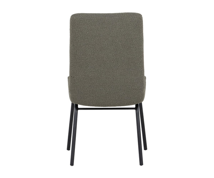 A modern Elyse 1000 Dining Chair featuring a tall, textured greenish-gray backrest designed to provide lumbar support and slim black metal legs, shown from the back against a white background.