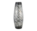 The Etched Lattice Vase features a tall, cylindrical shape crafted from hand-finished glass, showcasing abstract black, crisscrossed lines over a multi-toned surface—an ideal accent piece for any modern home.
