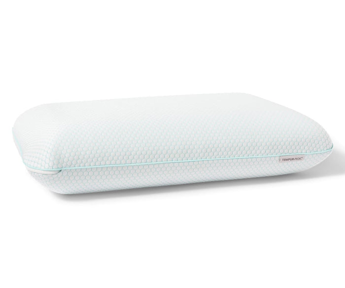 The Every Day Comfort Pillow, in white, features a rectangular shape with a textured cover and light blue piping along the edges. Made with TEMPUR-Material for exceptional support, it is displayed against a plain white background.