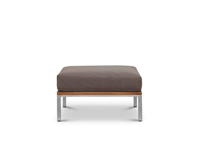 The Farino Outdoor Ottoman features a taupe, UV-resistant cushioned top, a wooden base, and sleek brushed stainless steel legs—perfect for coordinating with stainless steel furniture collections—and is shown against a plain white background.