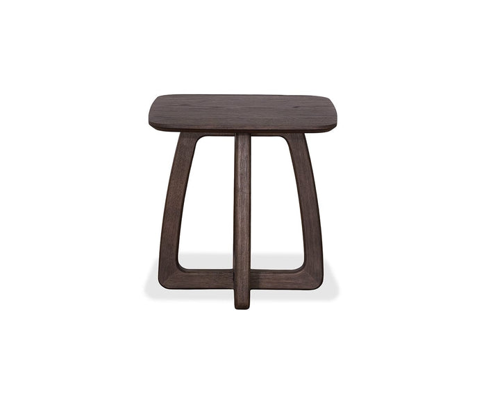 The Faroe Square End Table in smoked oak features a modern design with a dark wood veneer finish, a square top, and distinctively curved legs, displayed against a plain white background.