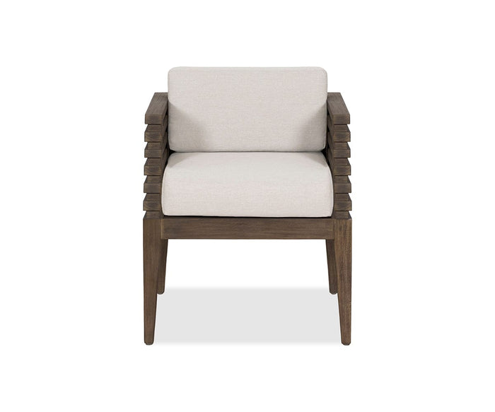 The Farren Outdoor Dining Chair, shown against a plain white background, features a modern wooden frame with slatted sides and straight legs, complemented by seat and back cushions in Farren Beige—making it an elegant addition to any patio furniture collection.