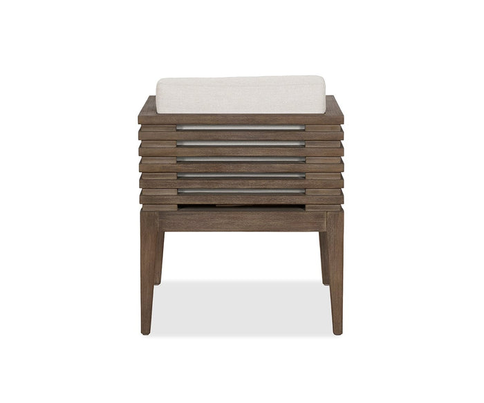 The Farren Outdoor Dining Chair showcases a modern, minimalist design with slatted wooden sides and back, complemented by a light beige cushion. Supported by four straight legs, this patio chair is presented against a plain white background.