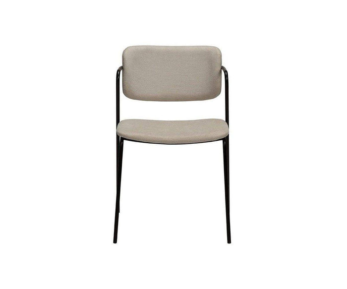 The Finn Dining Chair features a sand-colored cushioned seat and backrest, supported by slim black metal legs and frame, photographed against a plain white background.