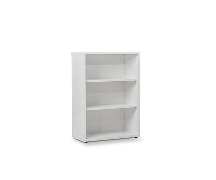 The Gammel Low Bookcase - White is displayed on a plain white background. This eco-friendly, three-shelf bookcase features a simple, modern design and is empty—making it ideal for stylish storage in any contemporary workspace.
