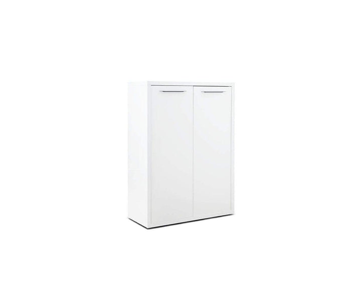 The Gammel Low Bookcase with Doors in white, featuring a modern rectangular design with two closed doors and sleek horizontal handles, stands against a plain white background.