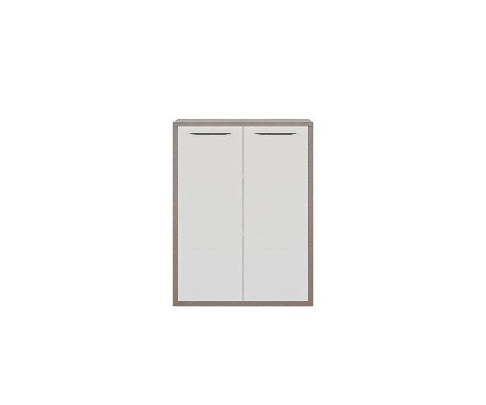 The Gammel Low Bookcase with Doors, featuring two high-gloss white doors with slim horizontal handles and framed by a truffle oak border, is centered on a plain white background.