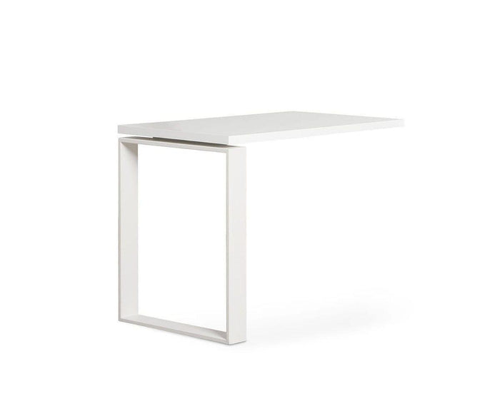 The Gammel Return Desk - White features a modern, minimalist design with a rectangular top and an open, geometric base that forms an L-shaped profile. Contemporary and eco-friendly, it functions perfectly as a stylish desk extension.