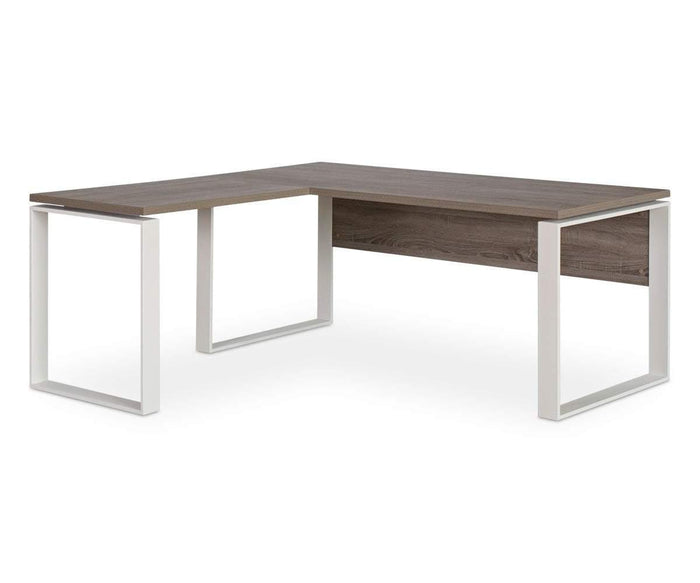 The Gammel Return Desk features an L-shaped design with a dark wood surface and a white metal frame, crafted in Italy. Showcasing open sides and a minimalist aesthetic, this eco-friendly desk is pictured empty against a plain white background.