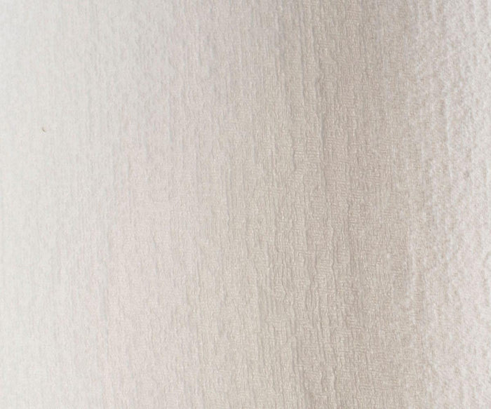 A close-up of a textured, off-white wall with subtle vertical patterns and gentle shading from left to right, creating an effect reminiscent of the soft illumination cast by the Gemma Floor Lamp, featuring a contemporary design with a brushed steel base and fabric shade.