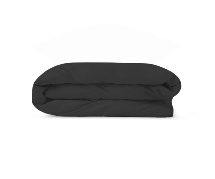 A neatly folded Graphite Sham—crafted from Fair Trade Certified organic cotton bed linen and designed with temperature-regulating properties in a black hue—is displayed against a white background.