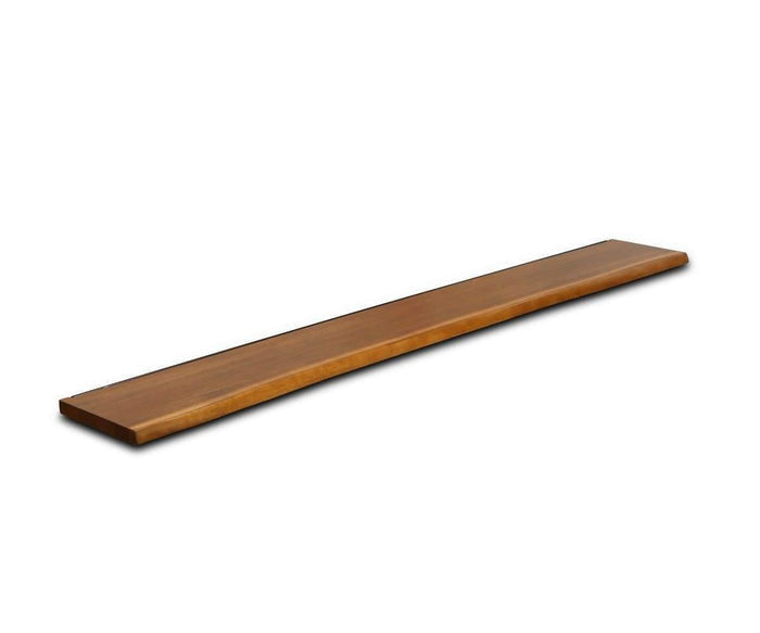 A long, narrow Hasse 71″ Shelf with a smooth, polished wooden surface, viewed from an angle against a white background.