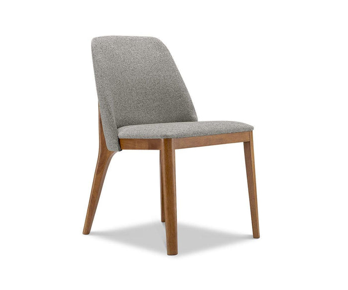 The Hendrick Dining Chair is a modern piece with a durable wooden frame, featuring a cushioned gray upholstered seat and backrest, shown against a white background.