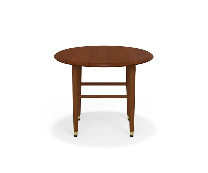 The Hendrick Round End Table, made from American poplar wood, features four tapered legs with brass caps and two horizontal support bars connecting the legs, set against a white background.