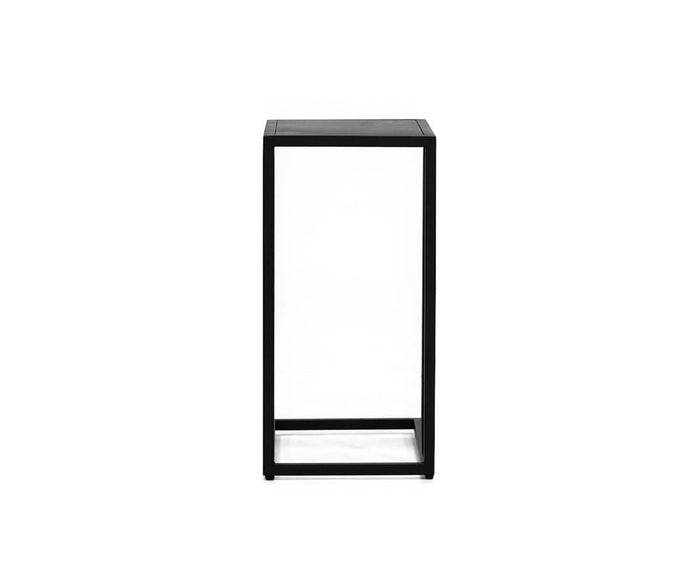 A minimalist, rectangular Heroy C-table in matte black features an open design and adds a sophisticated touch to industrial decor, shown from the front against a plain white background.